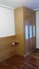 dormitorio roble 2 armarios y cabecero corrido