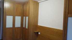 dormitorio roble 2 armarios y cabecero corrido